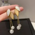 Golden Leaf Pearl Drop Earrings Thumbnail Image 3